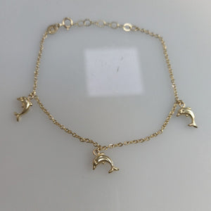 PULSERA ESPECIAL CON DIJES DELFINES 10K 18 CM 2 GR (NUEVO)