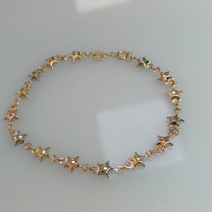 PULSERA TEJIDO ESPECIAL ESTRELLAS COMBINADAS 14K 18 CM 2.3 GR (NUEVO)