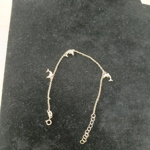 PULSERA ESPECIAL CON DIJES DELFINES 10K 18 CM 2 GR (NUEVO)