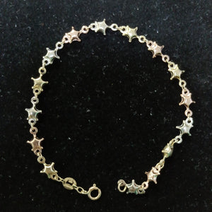 PULSERA TEJIDO ESPECIAL ESTRELLAS COMBINADAS 14K 18 CM 2.3 GR (NUEVO)