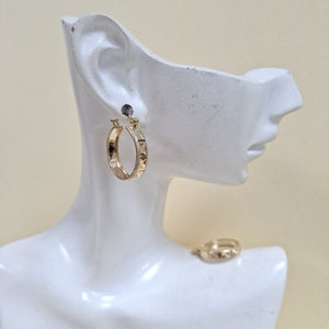 ARETES ARRACADAS LABRADAS 10K 2.1 GR (NUEVO)