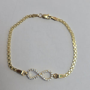 PULSERA TEJIDO ESPECIAL CON INFINITO Y CIRCONIAS 14K 18 CM 3.4 GR (NUEVO)