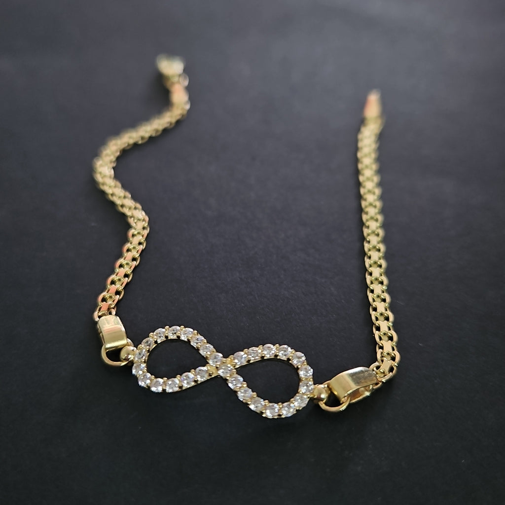 PULSERA TEJIDO ESPECIAL CON INFINITO Y CIRCONIAS 14K 18 CM 3.4 GR (NUEVO)
