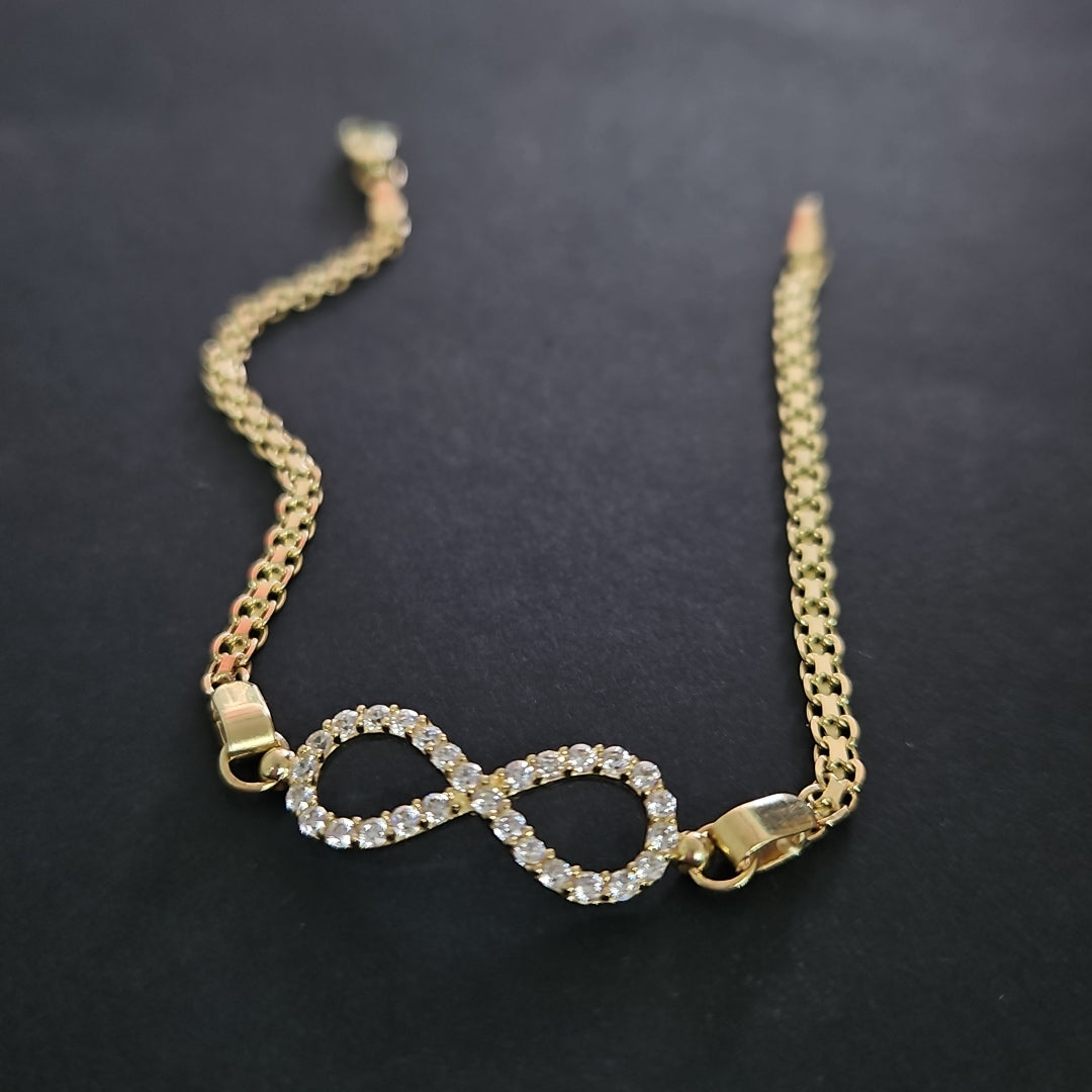 PULSERA TEJIDO ESPECIAL CON INFINITO Y CIRCONIAS 14K 18 CM 3.4 GR (NUEVO)