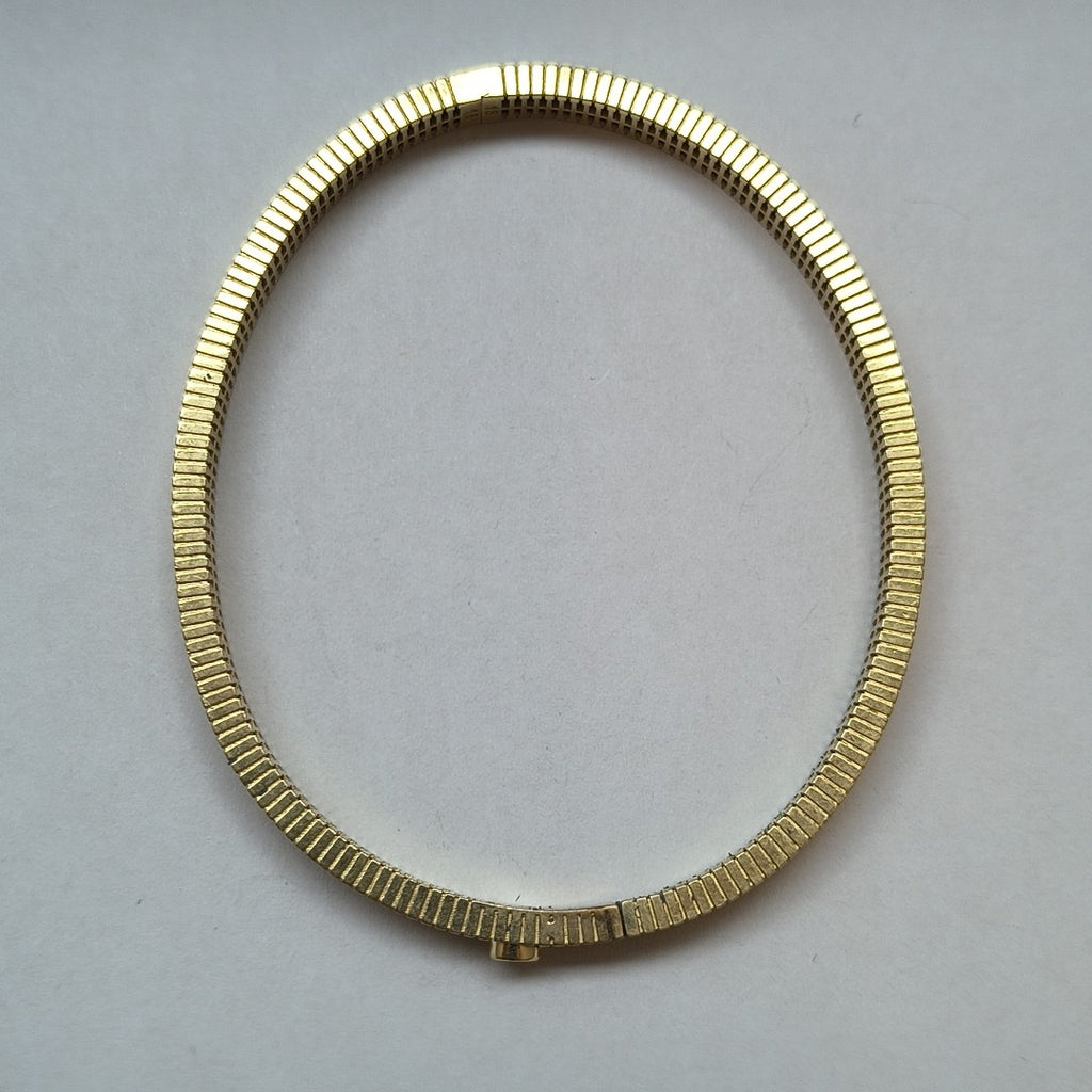 PULSERA RIGIDA ORO 10 K 7.6 GRMS (SEMINUEVO)