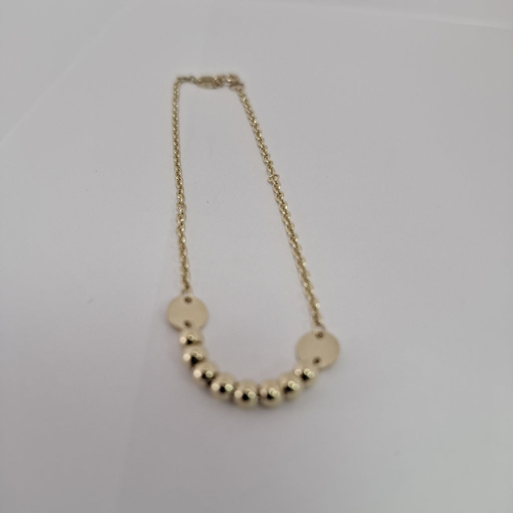 PULSERA TEJIDO ESPECIAL CON BOLITAS 14K 18 CM 1.8 GR (NUEVO)