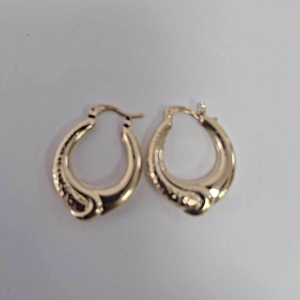 ARETES ARRACADAS ENTRELAZADAS 14K 2.6 GR (NUEVO)