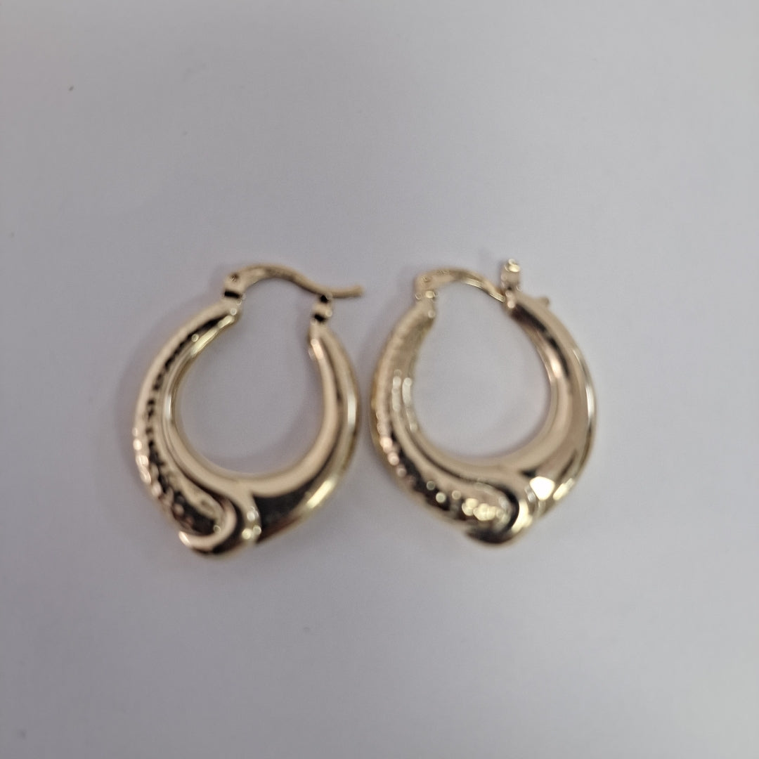 ARETES ARRACADAS ENTRELAZADAS 14K 2.6 GR (NUEVO)