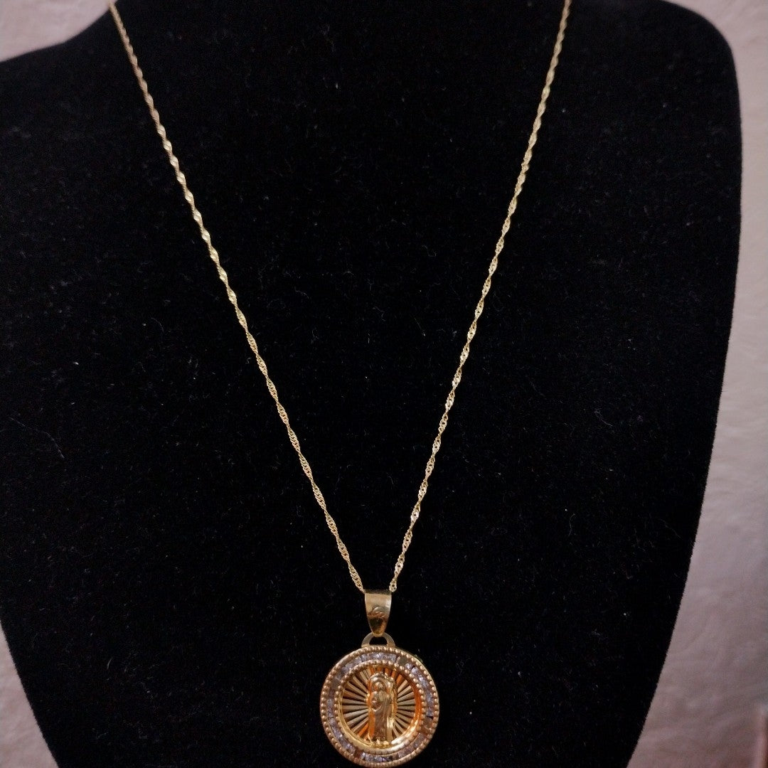 CADENA, MEDALLA RELIGIOSA ORO 10 K 2.1 GRMS (SEMINUEVO)