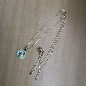 CADENA,MEDALLA RELIGIOSA ORO 10 K 1,90 GRMS (SEMINUEVO)