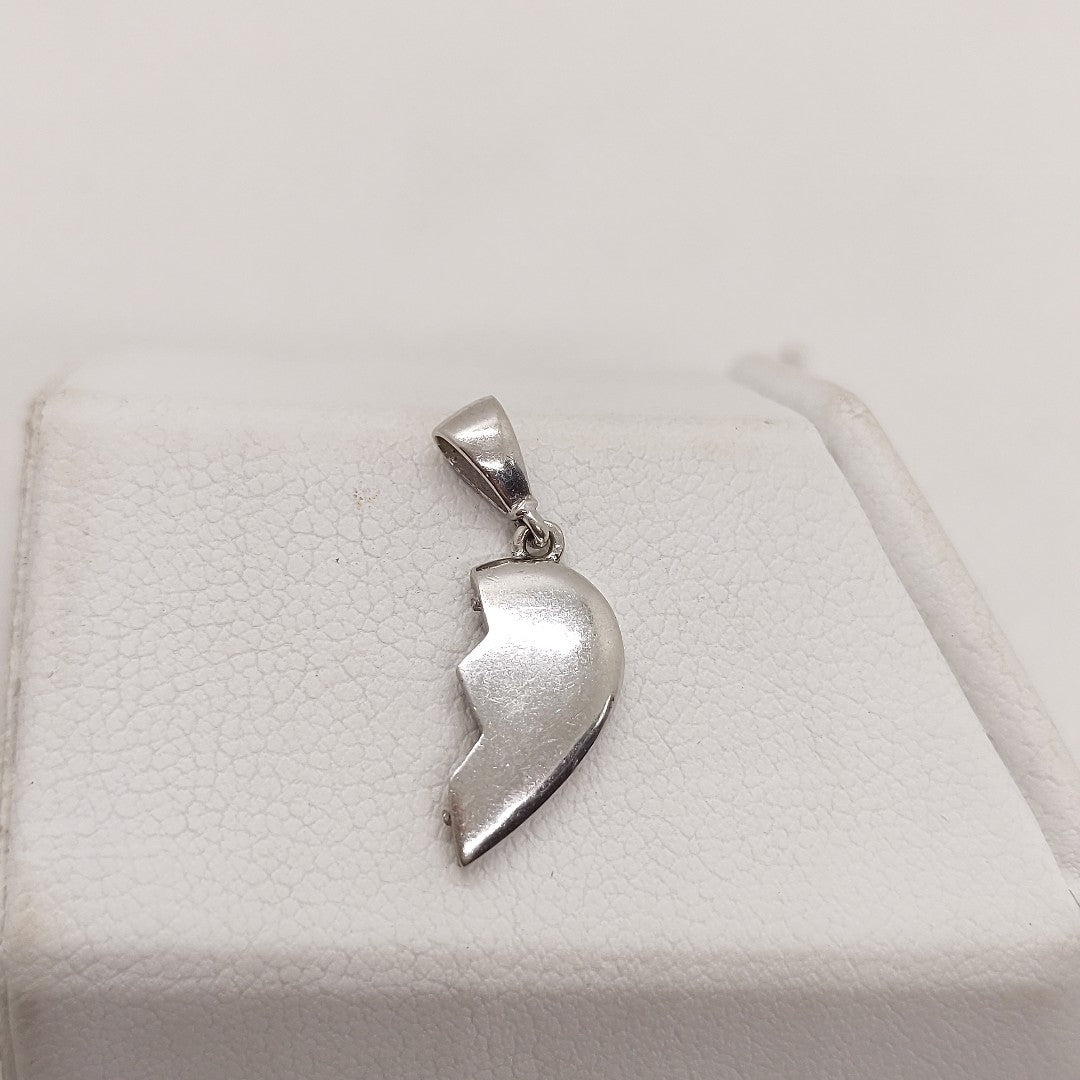 DIJE ORO BLANCO 10 K 0,80 GRMS (SEMINUEVO)