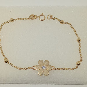 PULSERA TEJIDO ESPECIAL FLOR CON CIRCONIA 14K 18 CM 2.5 GR (NUEVO)