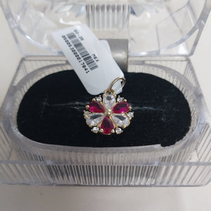 DIJE FLOR CIRCONIAS Y PIEDRAS DE COLOR 14K 2.8 GR (NUEVO)