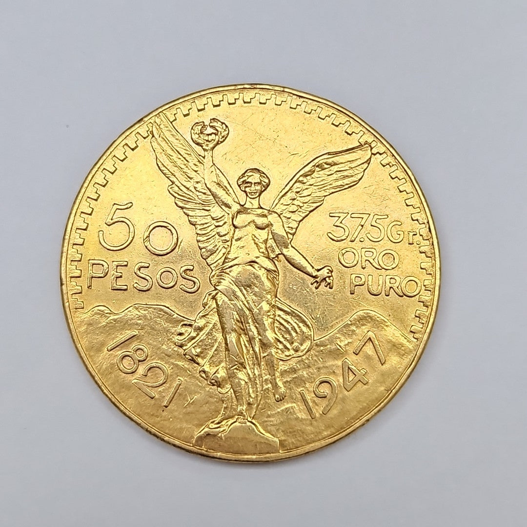 K1 41.6 GRMS 21 K IDENTIFICACIÓN MONEDA NOMINATIVA MATERIALES ORO CAN (SEMINUEVO)