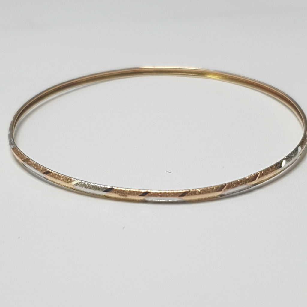 PULSERA RIGIDA ORO COMBINADO 10 K 3,30 GRMS (SEMINUEVO)