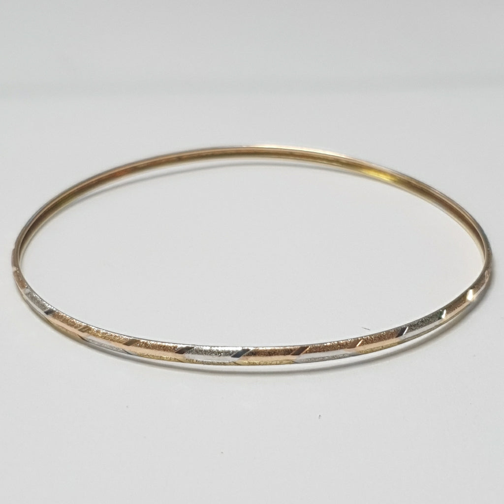 PULSERA RIGIDA ORO COMBINADO 10 K 3,20 GRMS (SEMINUEVO)