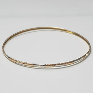 PULSERA RIGIDA ORO COMBINADO 10 K 3,20 GRMS (SEMINUEVO)