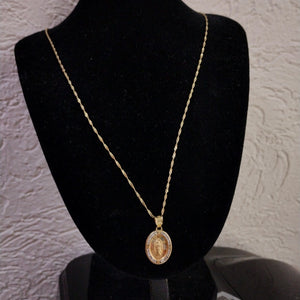 CADENA,MEDALLA RELIGIOSA ORO 10 K 2,10 GRMS (SEMINUEVO)