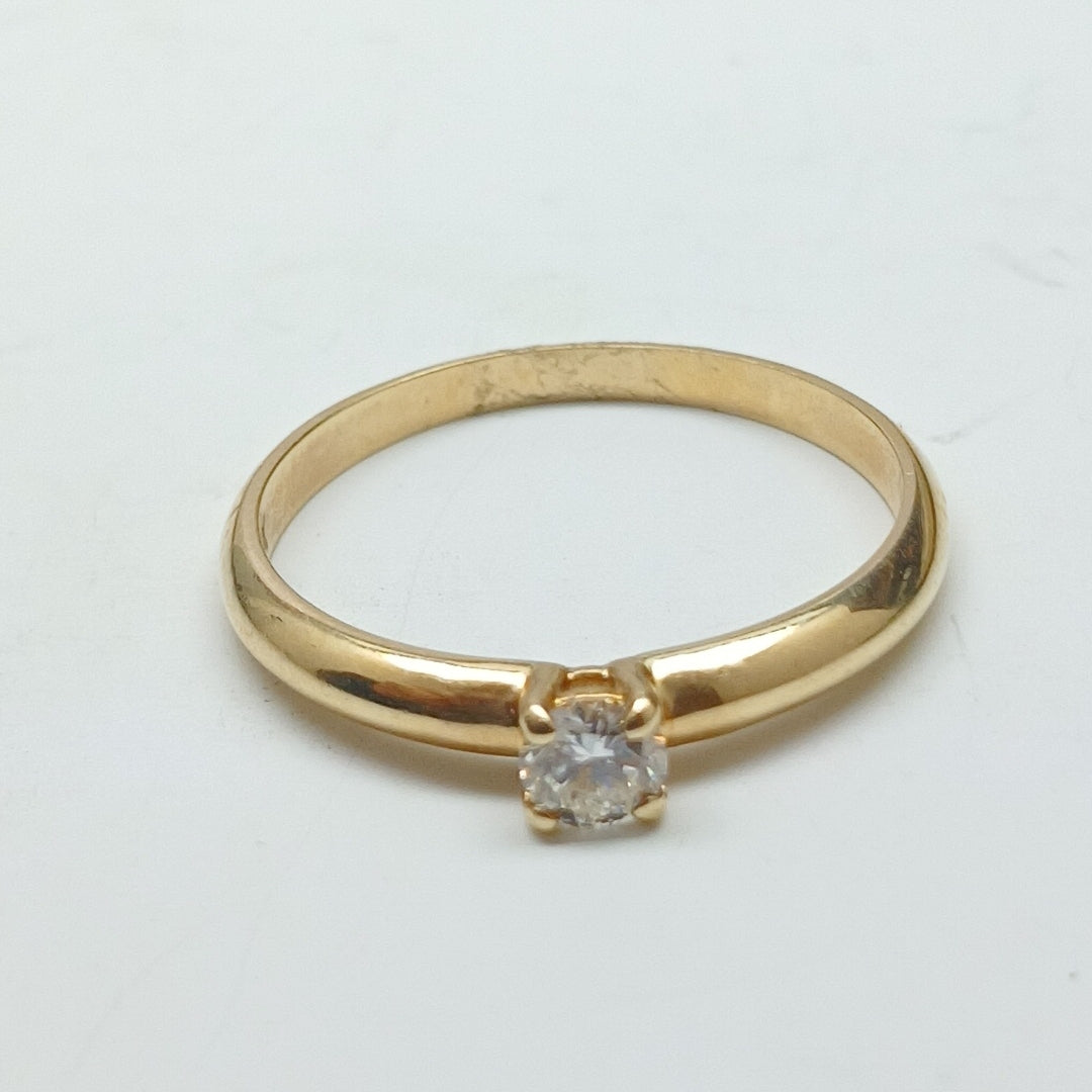 ANILLO SOLITARIO CON DIAMANTE CORTE BRILLANTE 0.16CTS LM SI2, 14K 1.7 G (NUEVO)