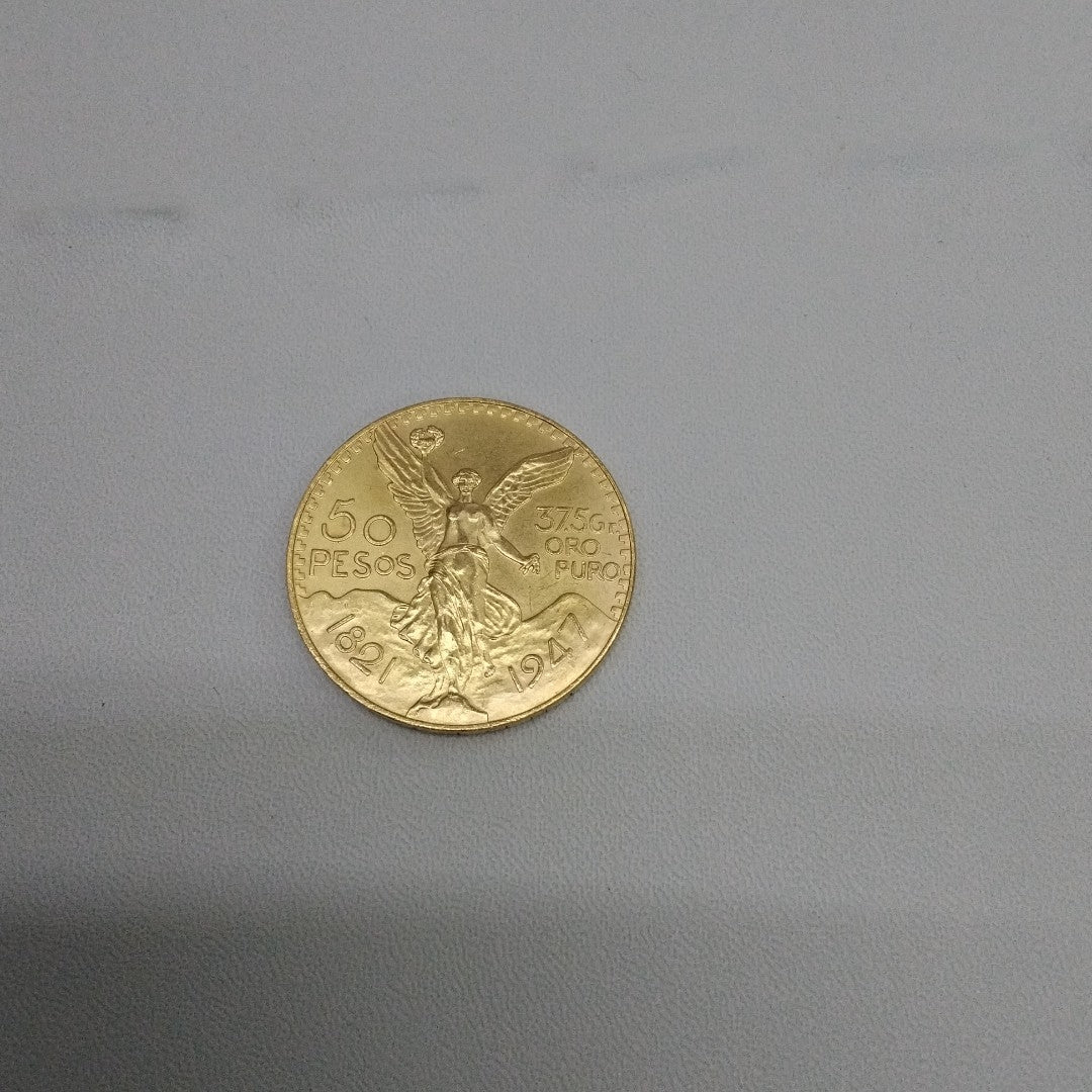 K1 41,60 GRMS - DTO. 0,00 GRMS - 21 K - AVALÚO 59155,20 * IDENTIFICACIÓN  MONEDA NOMINATIVA * MONEDAS PESOS  50 PESOS (SEMINUEVO)