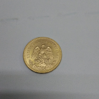 K1 41,60 GRMS - DTO. 0,00 GRMS - 21 K - AVALÚO 59155,20 * IDENTIFICACIÓN  MONEDA NOMINATIVA * MONEDAS PESOS  50 PESOS (SEMINUEVO)