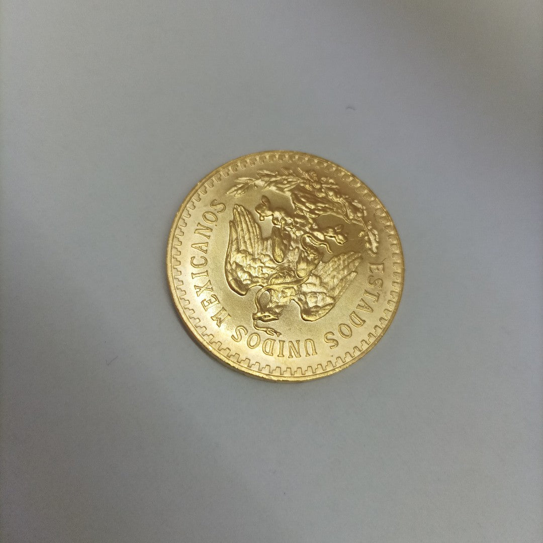 K1 41,60 GRMS - DTO. 0,00 GRMS - 21 K - AVALÚO 61776,00 * IDENTIFICACIÓN  MONEDA NOMINATIVA * MONEDAS PESOS  50 PESOS (SEMINUEVO)