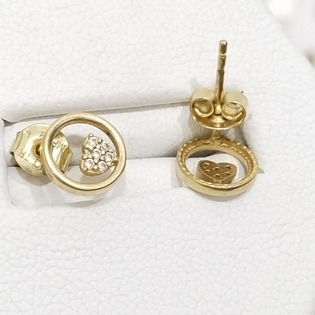 10024BRO00000B1116 FRD6 BROQUEL DE CIRCULO CON CORAZON DE CIRCONIAS ORO 14K 1.1GRS (NUEVO)