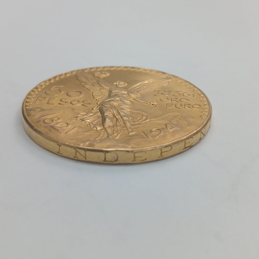 K1 41,60 GRMS - DTO. 0,00 GRMS - 21 K - AVALÚO 79372,80 * IDENTIFICACIÓN  MONEDA NOMINATIVA * MATERIALES  ORO * CANTID (SEMINUEVO)