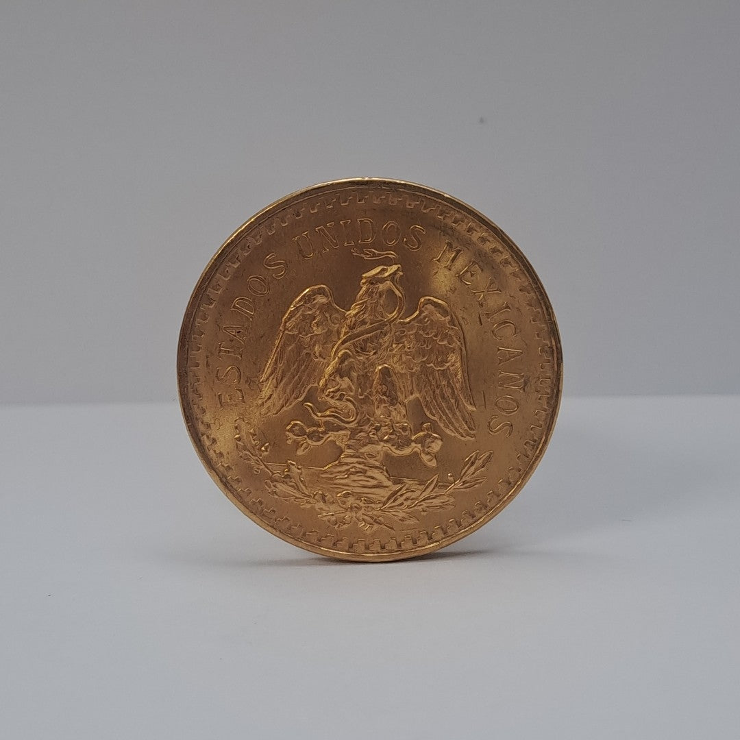 K1 41,60 GRMS - DTO. 0,00 GRMS - 21 K - AVALÚO 79372,80 * IDENTIFICACIÓN  MONEDA NOMINATIVA * MONEDAS PESOS  50 PESOS (SEMINUEVO)