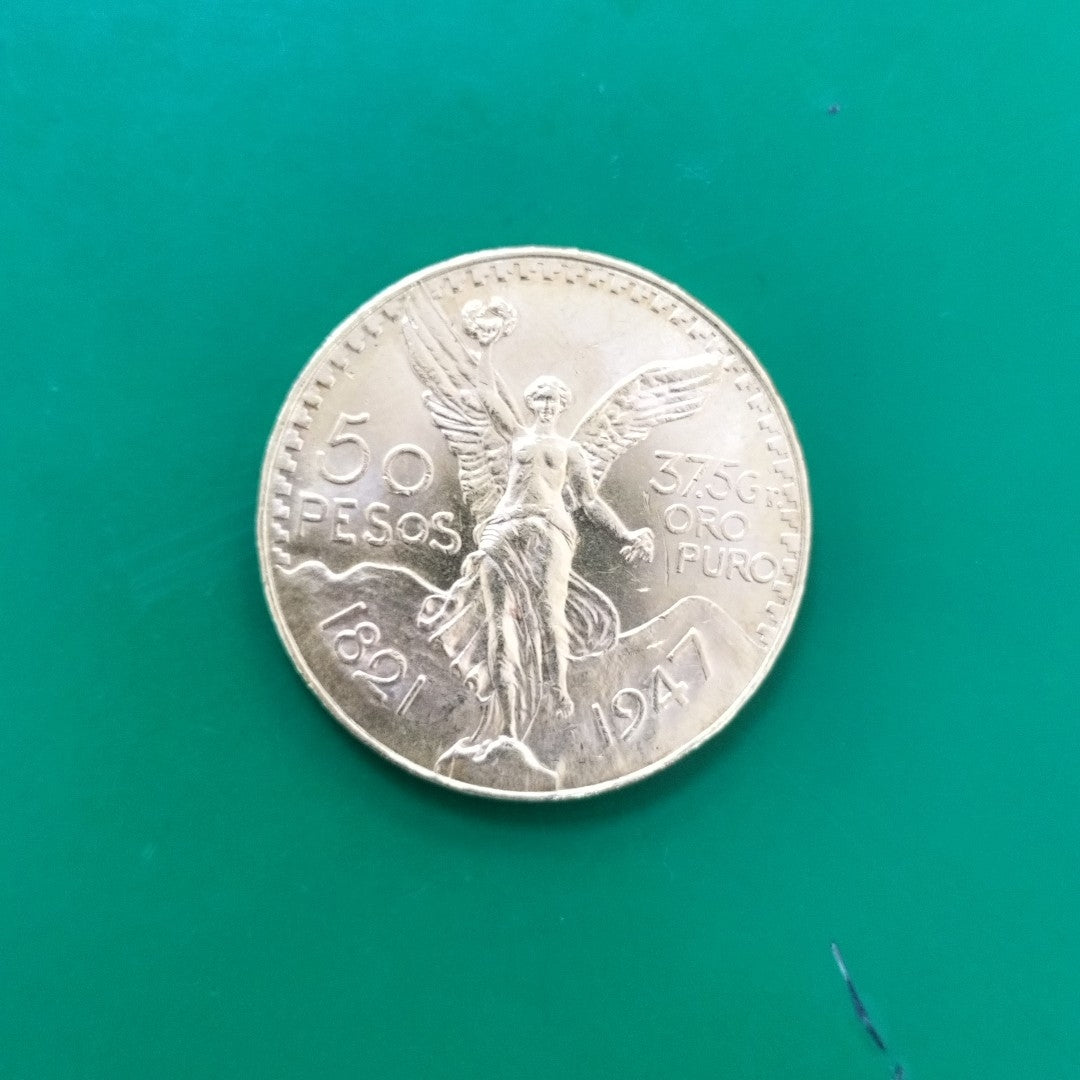 K1 41,60 GRMS - DTO. 0,00 GRMS - 21 K - AVALÚO 80496,00 * IDENTIFICACIÓN  MONEDA NOMINATIVA * MONEDAS PESOS  50 PESOS (SEMINUEVO)