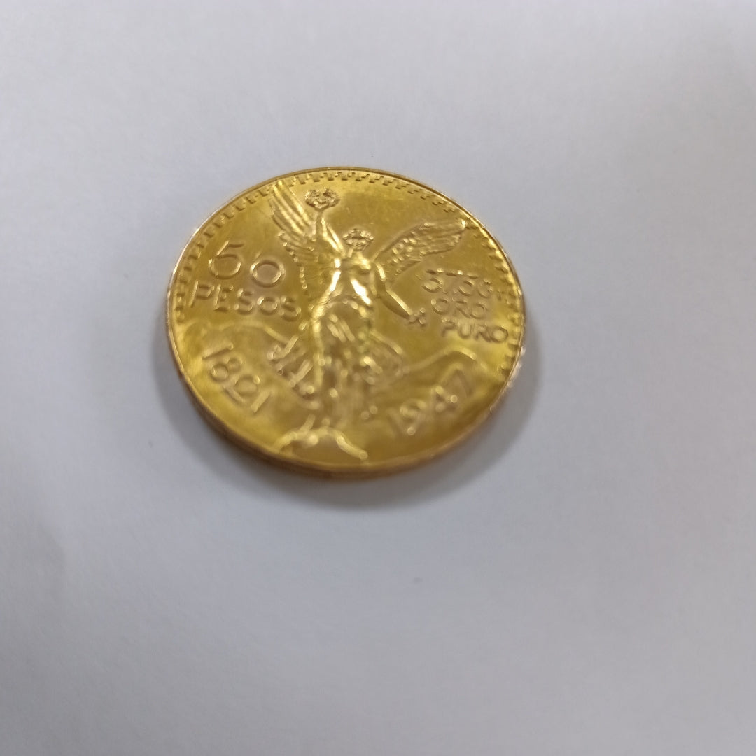 K1 41.6 GRMS - DESC.  0 GRAMOS - 21 K - AVALÚO  67392 * * IDENTIFICACIÓN  MONEDA NOMINATIVA. * MONEDAS PESOS  50 PESOS. (SEMINUEVO)