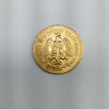 K1 41,60 GRMS - DTO. 0,00 GRMS - 21 K - AVALÚO 79372,80 * IDENTIFICACIÓN  MONEDA NOMINATIVA * MONEDAS PESOS  50 PESOS (SEMINUEVO)