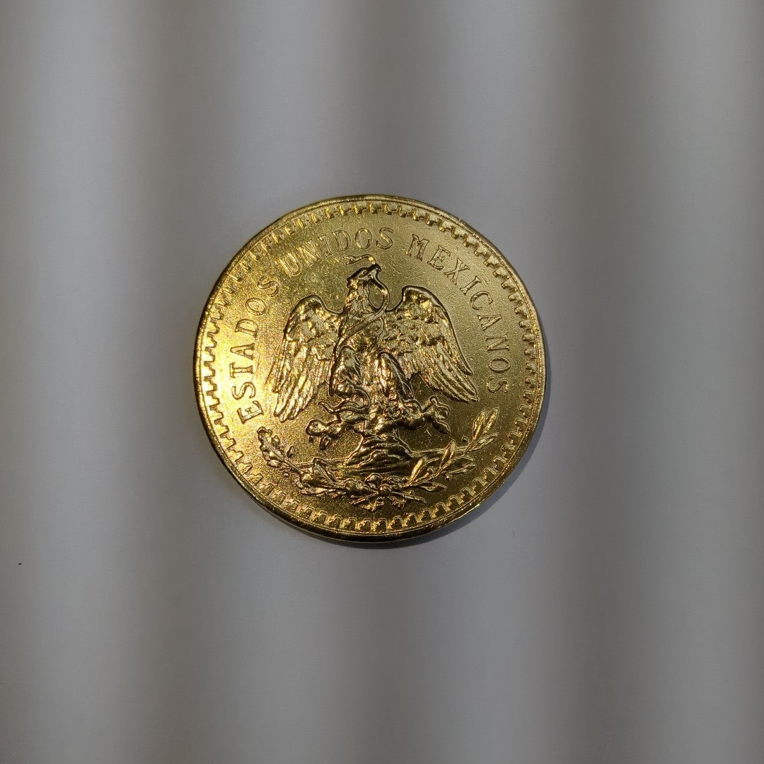 K1 41,60 GRMS - DTO. 0,00 GRMS - 21 K - AVALÚO 77688,00 * IDENTIFICACIÓN  MONEDA NOMINATIVA * MONEDAS PESOS  50 PESOS (SEMINUEVO)