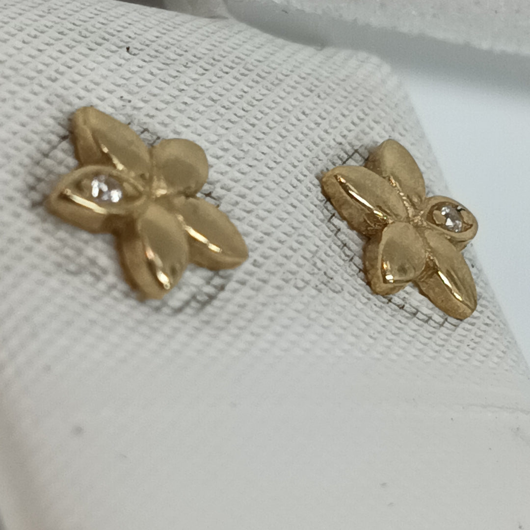 10021BRO44800B448 FRD4 BROQUEL DE FLOR 5 HOJAS CON UNA CIRCONIA ORO 14K 1GRS (NUEVO)