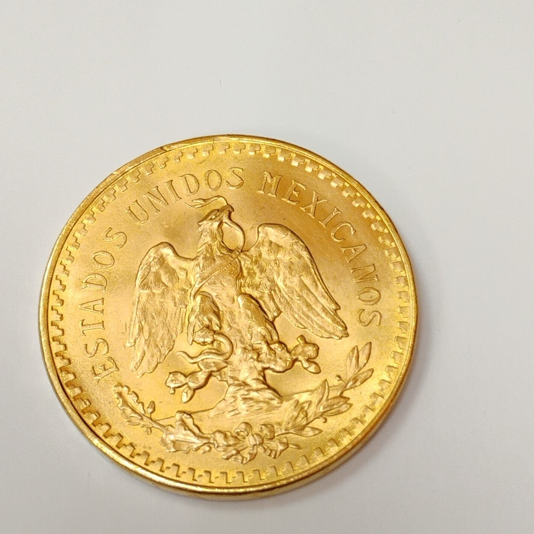 K1 41,60 GRMS - DTO. 0,00 GRMS - 21 K - AVALÚO 77126,40 * IDENTIFICACIÓN  MONEDA NOMINATIVA * MONEDAS PESOS  50 PESOS (SEMINUEVO)