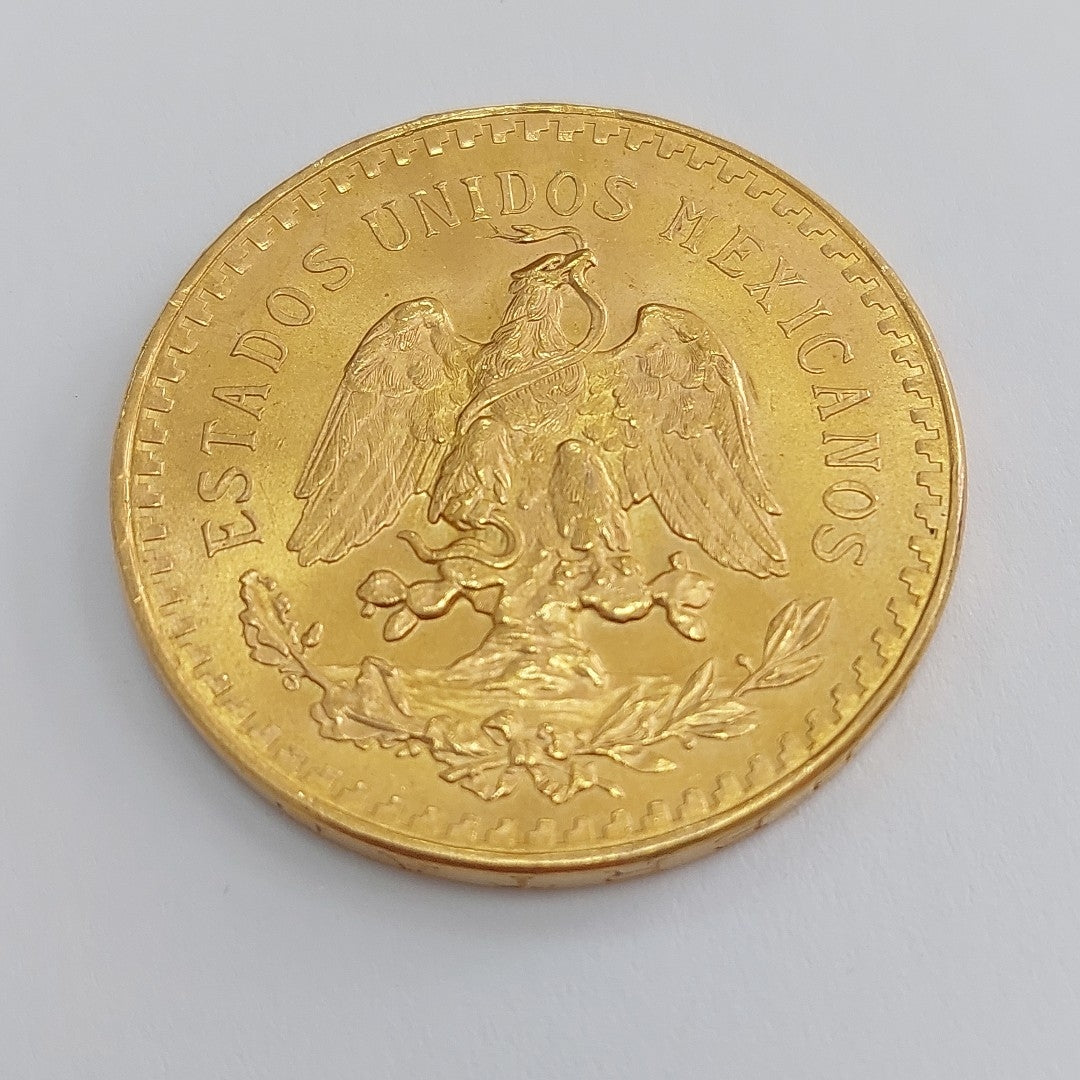 K1 41.6 GRMS - DESC.  0 GRAMOS - 21 K - AVALÚO  80870.4 * * IDENTIFICACIÓN  MONEDA NOMINATIVA. * MONEDAS PESOS  50 PESO (SEMINUEVO)