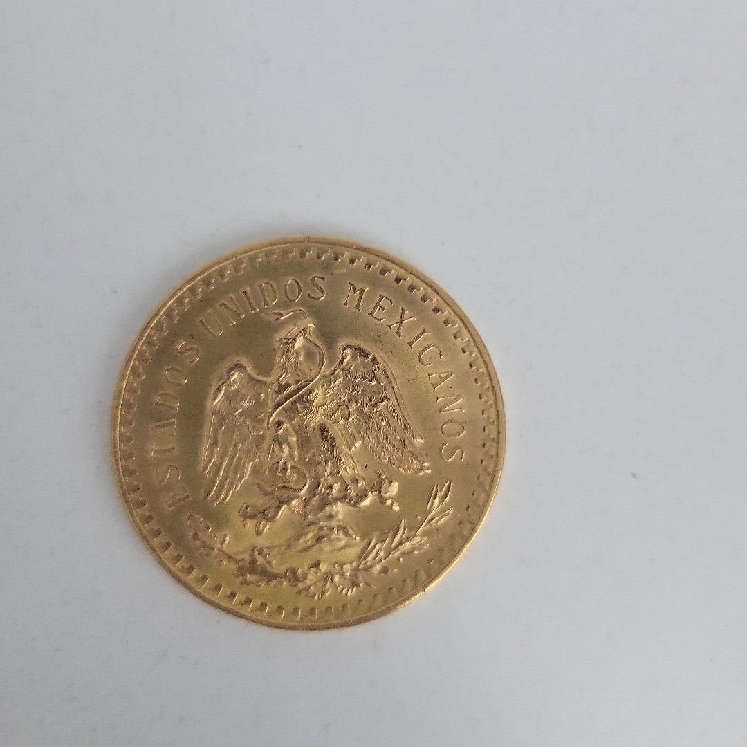 K1 41.6 GRMS - DESC.  0 GRAMOS - 21 K - AVALÚO  71884.8 * * IDENTIFICACIÓN  MONEDA NOMINATIVA. * MONEDAS PESOS  50 PESO (SEMINUEVO)