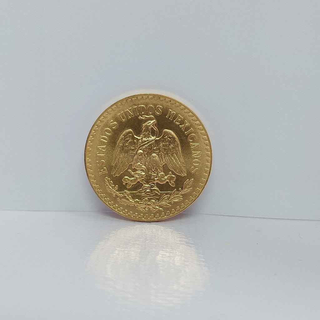 K1 41.6 GRMS - DESC.  0 GRAMOS - 21 K - AVALÚO  76377.6 * * IDENTIFICACIÓN  MONEDA NOMINATIVA. * MONEDAS PESOS  50 PESO (SEMINUEVO)