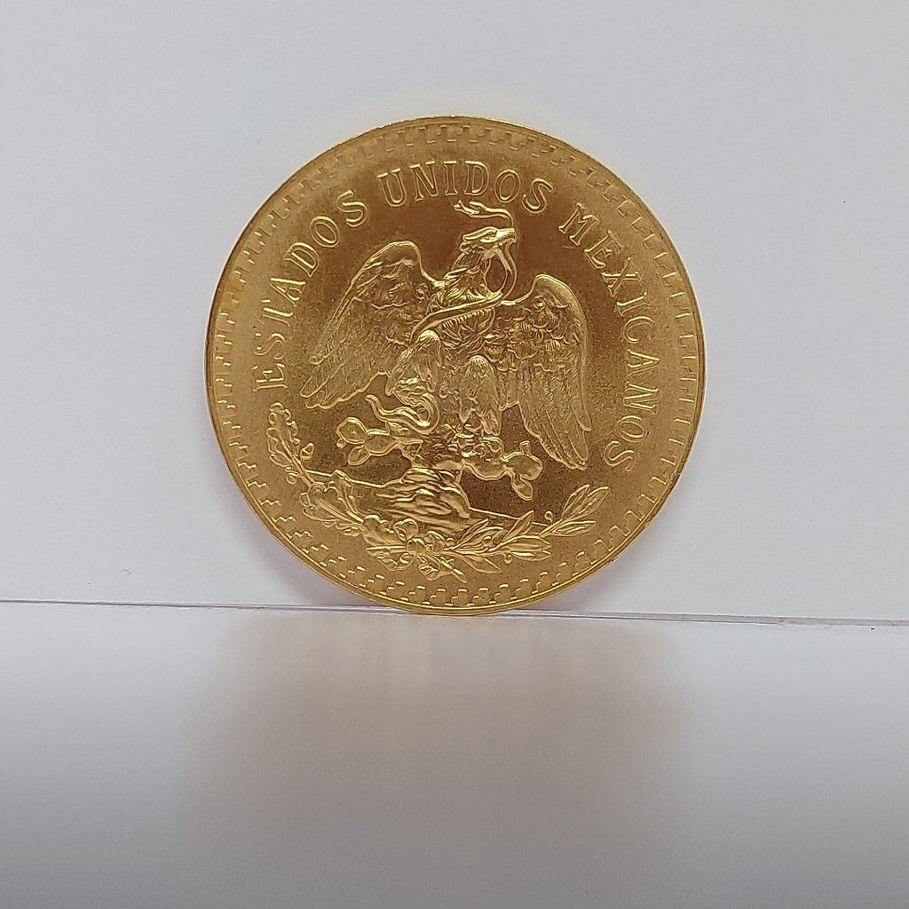 K1 41.6 GRMS - DESC.  0 GRAMOS - 21 K - AVALÚO  76377.6 * * IDENTIFICACIÓN  MONEDA NOMINATIVA. * MONEDAS PESOS  50 PESO (SEMINUEVO)