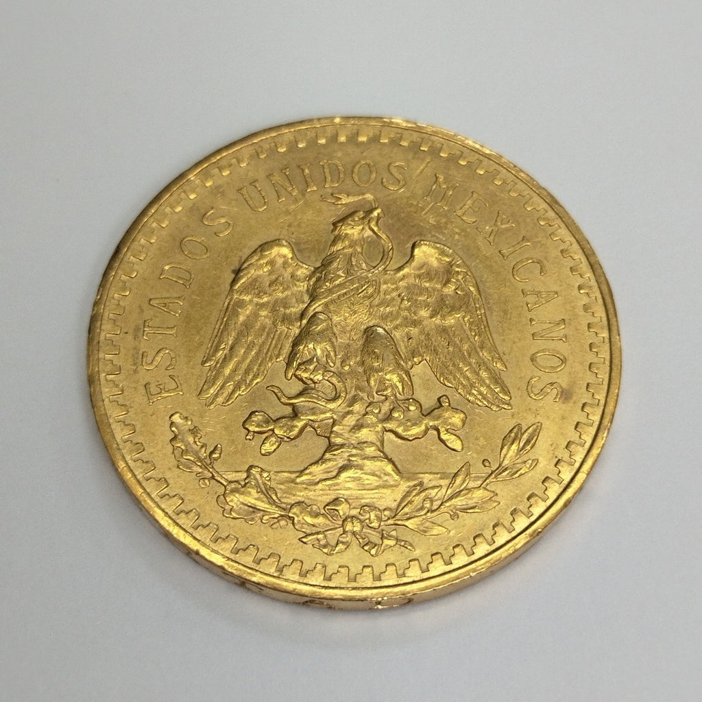 K1 41.6 GRMS - DESC.  0 GRAMOS - 21 K - AVALÚO  71884.8 * * IDENTIFICACIÓN  MONEDA NOMINATIVA. * MONEDAS PESOS  50 PESO (SEMINUEVO)