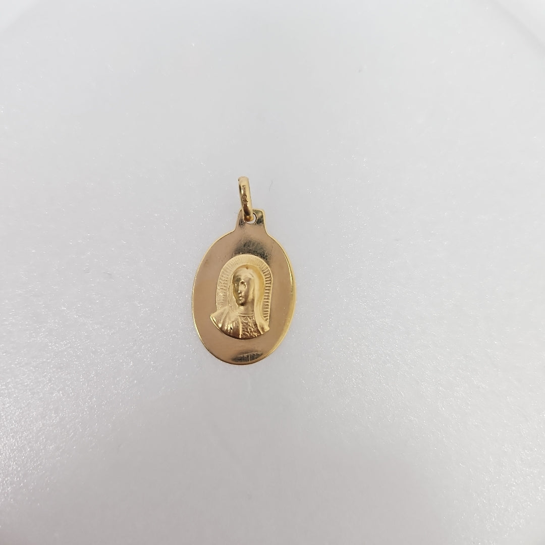 10007REL12000B120 FRD3 MEDALLA OVALADA CON IMAGEN DE LA VIRGEN AL RELIEVE ORO 14K 1.2GRS (NUEVO)