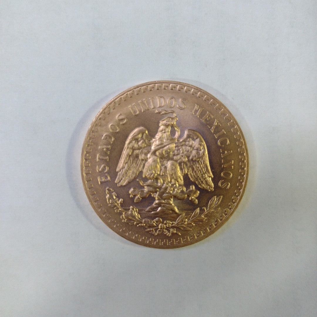 K1 41,60 GRMS - DTO. 0,00 GRMS - 21 K - AVALÚO 77126,40 * IDENTIFICACIÓN  MONEDA NOMINATIVA * MATERIALES  ORO * ESPECI (SEMINUEVO)