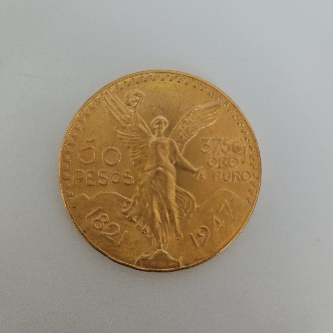K1 41,60 GRMS - DTO. 0,00 GRMS - 21 K - AVALÚO 76003,20 * IDENTIFICACIÓN  MONEDA NOMINATIVA * MONEDAS PESOS  50 PESOS (SEMINUEVO)