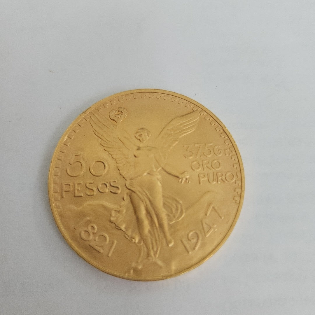 K1 41.6 GRMS - DESC.  0 GRAMOS - 21 K - AVALÚO  75254.4 * * IDENTIFICACIÓN  MONEDA NOMINATIVA. * MONEDAS PESOS  50 PESO (SEMINUEVO)