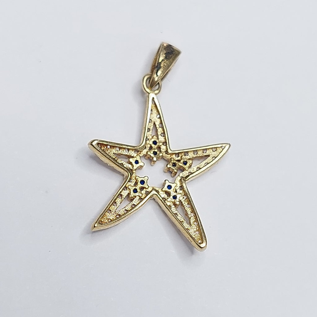 10297DIJ00000B363 FRD5 DIJE ESTRELLA DE MAR CON CIRCONIAS BLANCAS Y AZULES ORO 14K 1.5GRS (NUEVO)
