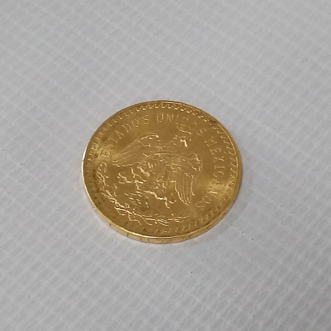 K1 41.6 GRMS - DESC. 0 GRAMOS - 21 K - AVALÚO 74131.2 * * IDENTIFICACIÓN MONEDA NOMINATIVA. * MONEDAS PESOS 50 PESO (SEMINUEVO)