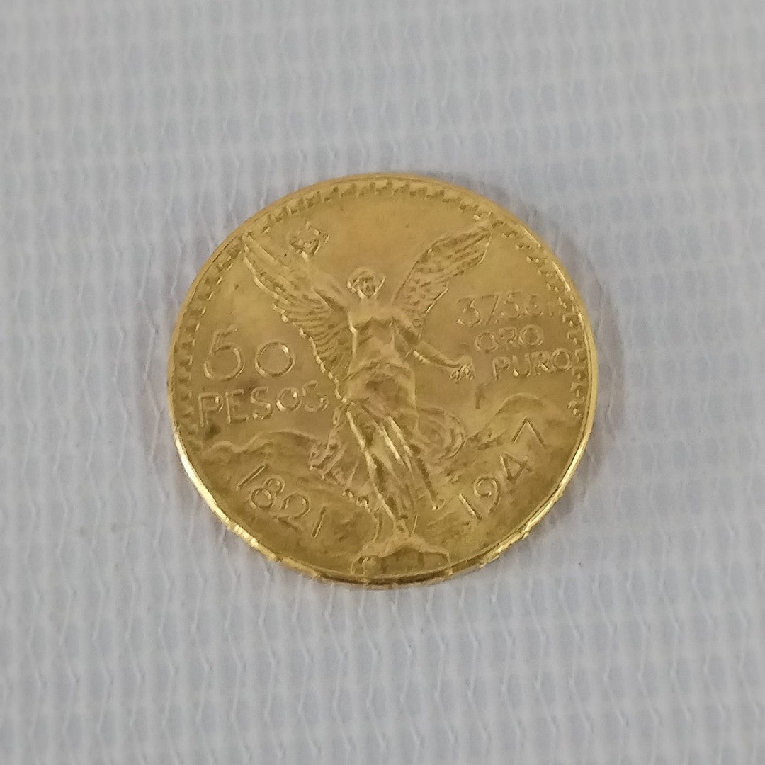 K1 41,60 GRMS - DTO. 0,00 GRMS - 21 K - AVALÚO 76003,20 * IDENTIFICACIÓN MONEDA NOMINATIVA * MONEDAS PESOS 50 PESOS (SEMINUEVO)