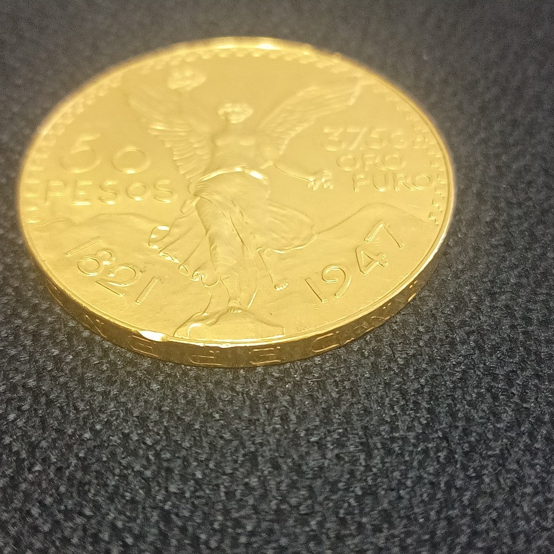 K1 41.66 GRMS - DESC. 0 GRAMOS - 21 K - AVALÚO 77800.05 * * IDENTIFICACIÓN MONEDA NOMINATIVA. * MONEDAS PESOS 50 PE (SEMINUEVO)