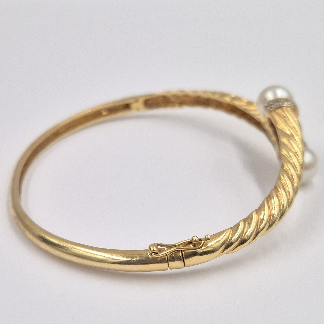 PULSERA RIGIDA. ORO. 10 K 16.9 GRMS (SEMINUEVO)