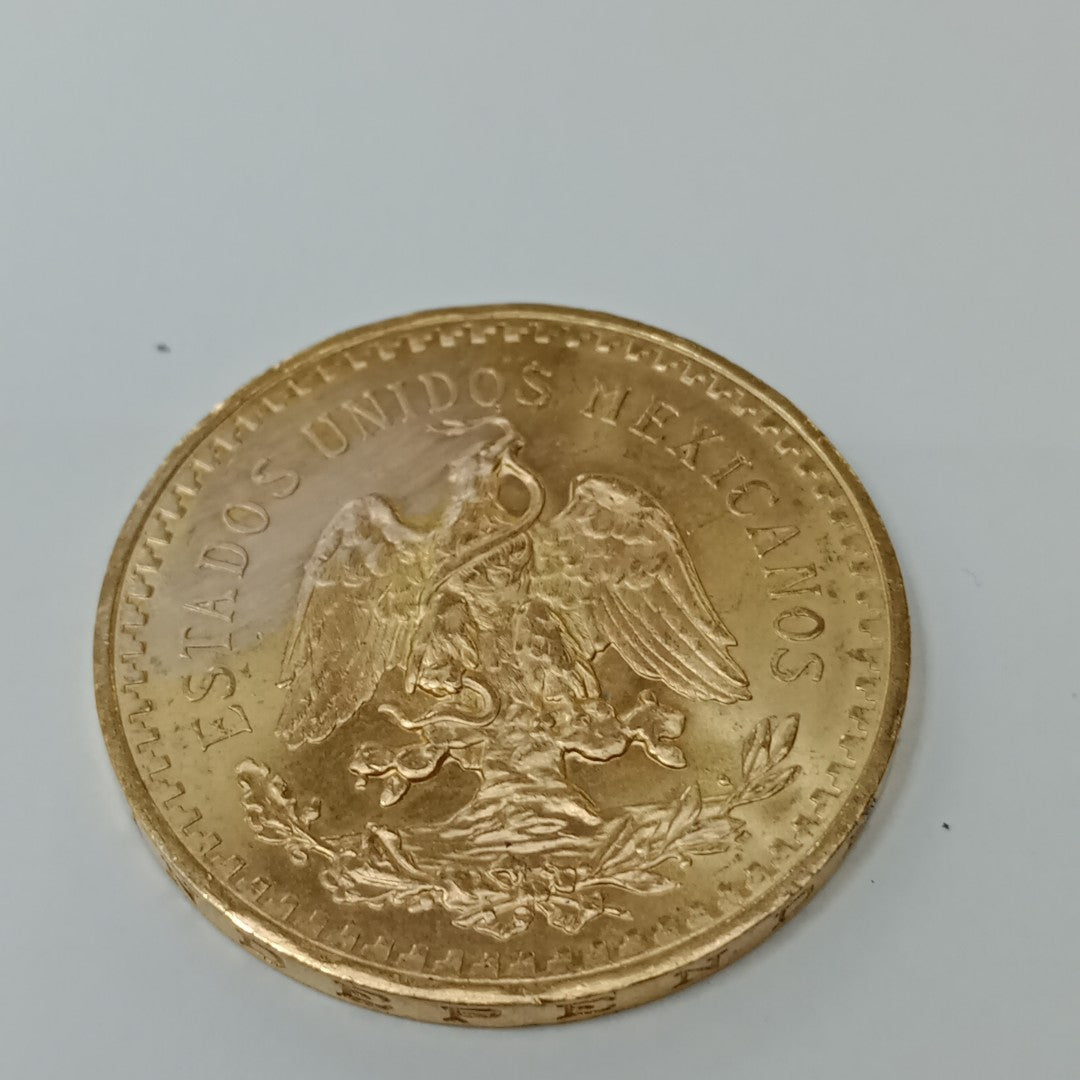 K1 41,60 GRMS - DTO. 0,00 GRMS - 21 K - AVALÚO 76003,20 * IDENTIFICACIÓN MONEDA NOMINATIVA * MATERIALES ORO * ESPECI (SEMINUEVO)